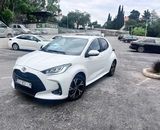 Toyota Yaris 2026 car hire in Croatia, featuring ✓ Hybrid fuel and 90 horsepower ➤ Starting from 32 EUR per day.