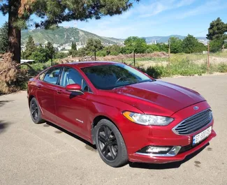 Ford Fusion Sedan 2018 araç kiralama Gürcistan'da, ✓ Benzin yakıt ve 188 beygir gücü özellikleriyle ➤ Günde başlayan fiyatlarla 110 GEL.