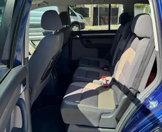 Volkswagen Touran 2010 available for rent in Tirana, with unlimited mileage limit.