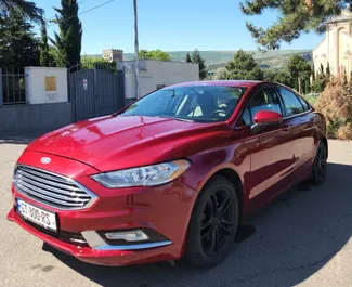 Kiralık bir Ford Fusion Sedan Tiflis'te, Gürcistan ön görünümü ✓ Araç #16508. ✓ Otomatik TM ✓ 0 yorumlar.