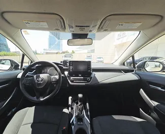 Interior of Toyota Corolla Sedan for hire in Georgia. A Great 5-seater car with a Automatic transmission.