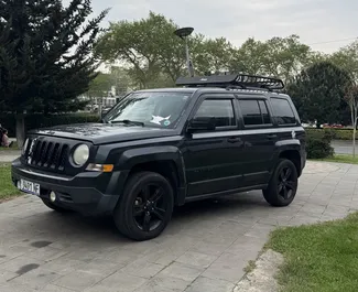 Front view of a rental Jeep Patriot in Tbilisi, Georgia ✓ Car #1314. ✓ Automatic TM ✓ 22 reviews.