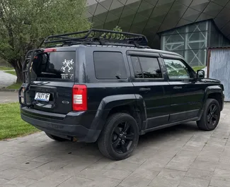 Petrol 2.4L engine of Jeep Patriot 2017 for rental in Tbilisi.