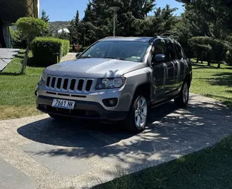 Front view of a rental Jeep Compass in Tbilisi, Georgia ✓ Car #1560. ✓ Automatic TM ✓ 8 reviews.