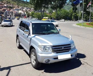 Frontansicht eines Mietwagens Mitsubishi Pajero Io in Tiflis, Georgien ✓ Auto Nr.16680. ✓ Automatisch TM ✓ 0 Bewertungen.