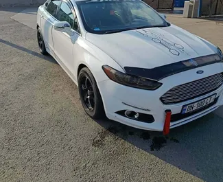 Vermietung Ford Fusion Sedan. Komfort Fahrzeug zur Miete in Georgien ✓ Kaution Keine Kaution ✓ Versicherungsoptionen KFZ-HV, TKV, VKV Plus, VKV Komplett, Insassen, Diebstahlschutz.
