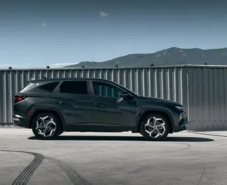 Hyundai Tucson 2022 car hire in Georgia, featuring ✓ Petrol fuel and 186 horsepower ➤ Starting from 140 GEL per day.