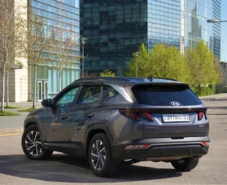 Wnętrze Hyundai Tucson do wynajęcia w Kazachstanie. Doskonały samochód 5-osobowy. ✓ Skrzynia Automatyczna.